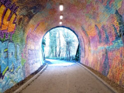 Brightly coloured mural within the Colinton Tunnel in Edinburgh