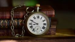Old books and a pocket watch