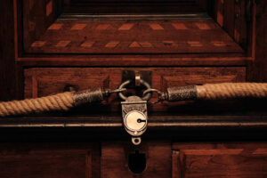 Padlocked cabinet in an escape room game
