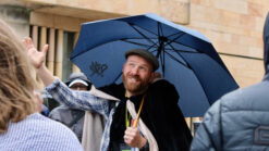 Tour guide under an umbrella in Edinburgh