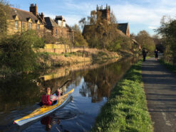 Kayakers and walkers on the Union Canal Edinburgh