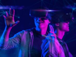 Two people wearing VR headsets